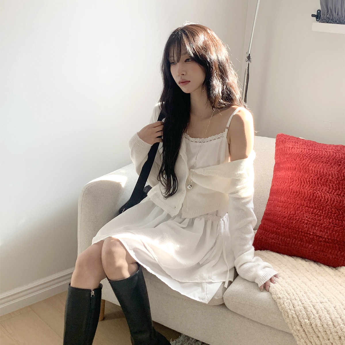Slip dress with knee high boots and cardigan